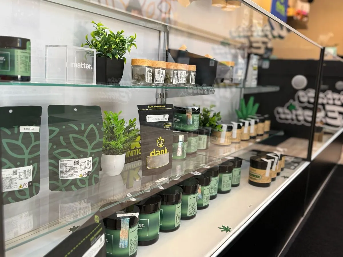 Cannabis flower jars in the glass display counter at Upstate Exotics in Niagara Falls, NY