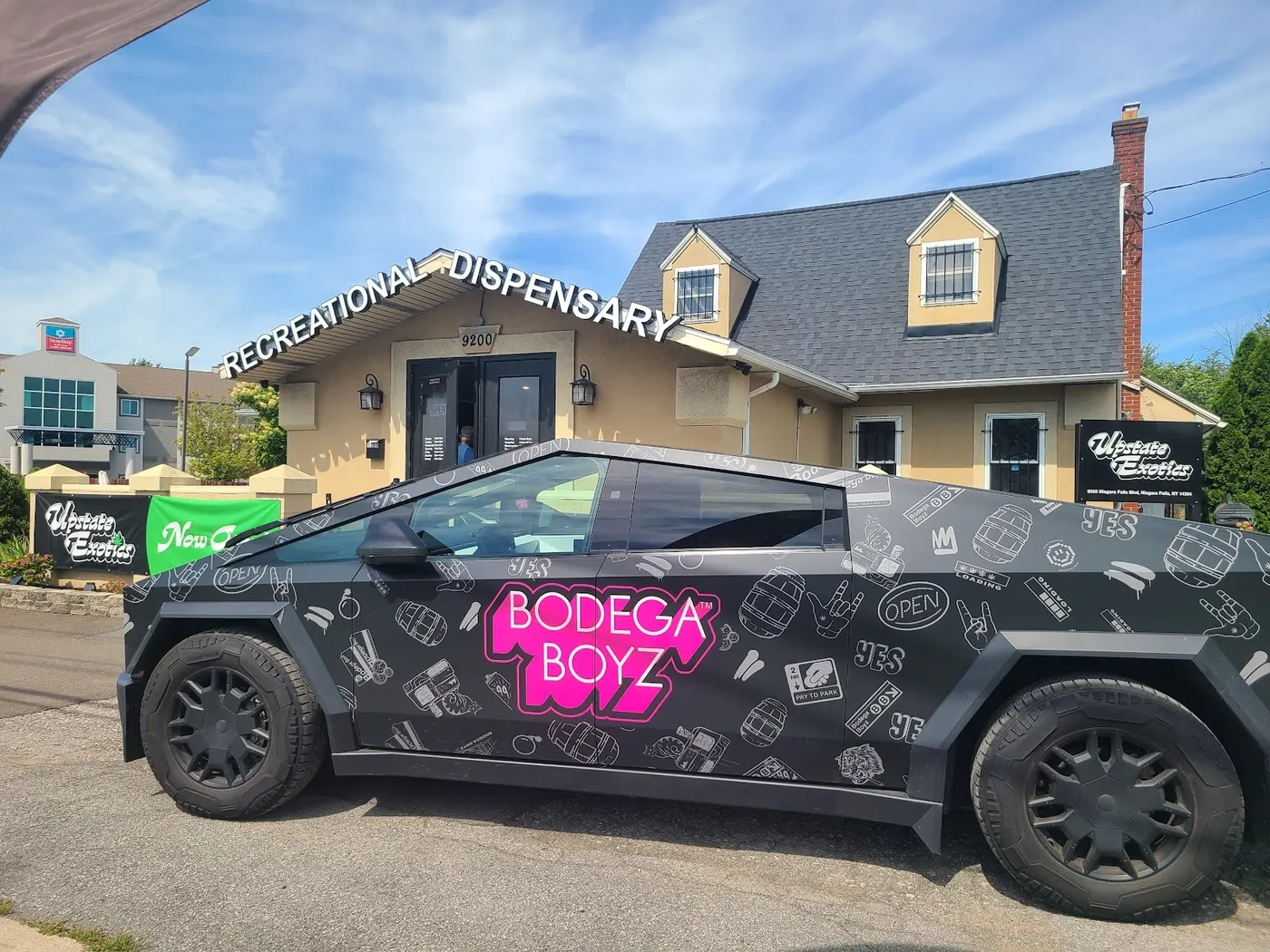 Upstate Exotics recreational dispensary roof sign on Niagara Falls Blvd in Niagara Falls, NY